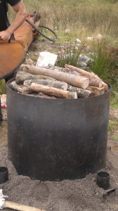 Loading the charcoal kiln...