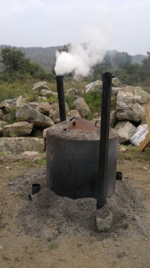 ...the charcoal kiln lit and ready to burn for the next 24 hours!