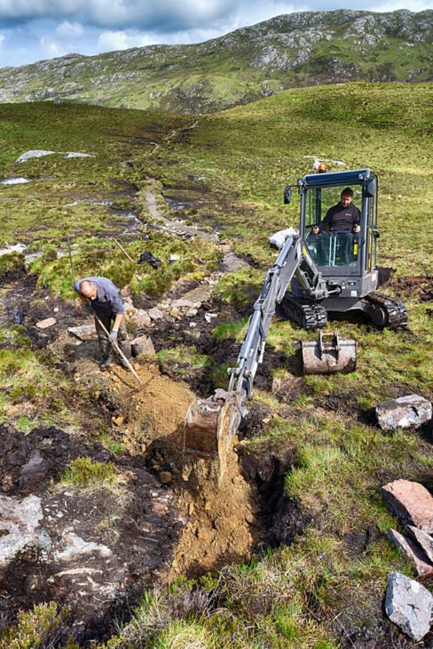 Precision work with the digger. Photo © Chris Puddephatt