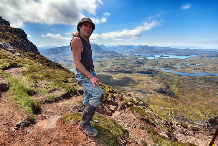 Johny enjoying the view from the work site. Photo © Chris Puddephatt