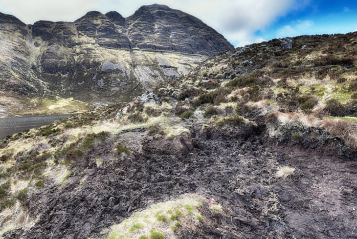 One of the boggy peaty sections of the path. Photo © Chris Puddephatt.